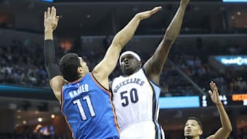 Dec 29, 2016; Memphis, TN, USA; Memphis Grizzlies forward Zach Randolph (50) shoots over Oklahoma City Thunder center Enes Kanter (11) in the first half at FedExForum. Mandatory Credit: Nelson Chenault-USA TODAY Sports