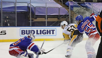 NEW YORK, NEW YORK - JANUARY 30: Alexandar Georgiev #40 and Ryan Lindgren #55 of the New York Rangers defend against Teddy Blueger #53 of the Pittsburgh Penguins during the first period at Madison Square Garden on January 30, 2021 in New York City. (Photo by Bruce Bennett/Getty Images)