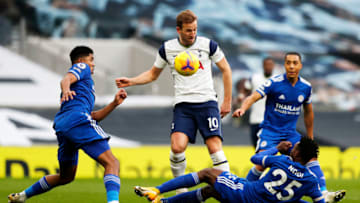 LONDON, ENGLAND - DECEMBER 20: Harry Kane of Tottenham Hotspur is challenged by Wilfred Ndidi (r) and James Justin of Leicester City during the Premier League match between Tottenham Hotspur and Leicester City at Tottenham Hotspur (Photo by Frank Augstein - Pool/Getty Images)