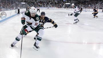 Sep 26, 2016; State College, PA, USA; Minnesota Wild forward Ryan Carter (18) handles the puck during the second period against the Buffalo Sabres during a preseason hockey game at Pegula Ice Arena. The Wild defeated the Sabres 2-1. Mandatory Credit: Matthew O