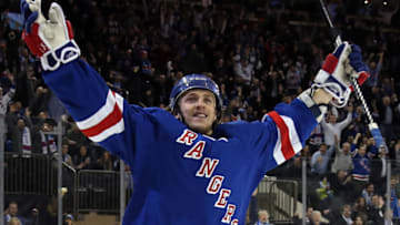 NEW YORK, NY - JANUARY 20: Carl Hagelin #62 of the New York Rangers celebrates his game winning goal against Craig Anderson #41 of the Ottawa Senators to defeat the Ottawa Senators in overtime in their game at Madison Square Garden on January 20, 2015 in New York City. (Photo by Bruce Bennett/Getty Images)