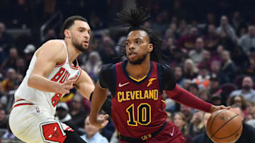 Mar 26, 2022; Cleveland, Ohio, USA; Cleveland Cavaliers guard Darius Garland (10) dribbles past Chicago Bulls guard Zach LaVine (8) during the first quarter at Rocket Mortgage FieldHouse. Mandatory Credit: Ken Blaze-USA TODAY Sports
