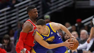 CHICAGO, IL - JANUARY 17: Klay Thompson #11 of the Golden State Warriors moves against David Nwaba #11 of the Chicago Bulls at the United Center on January 17, 2018 in Chicago, Illinois. The Warriors defeated the Bulls 119-112. NOTE TO USER: User expressly acknowledges and agrees that, by downloading and or using this photograph, User is consenting to the terms and conditions of the Getty Images License Agreement. (Photo by Jonathan Daniel/Getty Images)