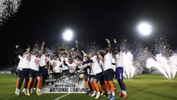 CARY, NORTH CAROLINA - DECEMBER 12: The Syracuse Orange celebrate their win over the Indiana Hoosiers for the Division I Men’s Soccer Championship at Sahlen's Stadium at WakeMed Soccer Park on December 12, 2022 in Cary, North Carolina. (Photo by Eakin Howard/Getty Images)