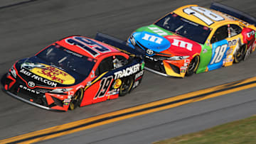 Martin Truex Jr. and Kyle Busch, Joe Gibbs Racing, NASCAR (Photo by Brian Lawdermilk/Getty Images)