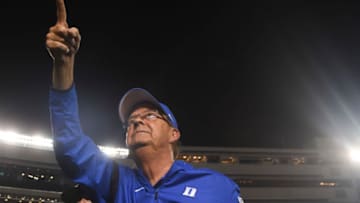 BLACKSBURG, VA - SEPTEMBER 27: Head coach David Cutcliffe of the Dukes Blue Devils points to the away crowd as he leaves the field following the victory against the Virginia Tech Hokies at Lane Stadium on September 27, 2019 in Blacksburg, Virginia. (Photo by Michael Shroyer/Getty Images)