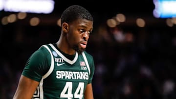 Michigan State forward Gabe Brown (44) walks back to the court after a timeout against Duke during the second half of the second round of the NCAA tournament at the Bon Secours Wellness Arena in Greenville, S.C..