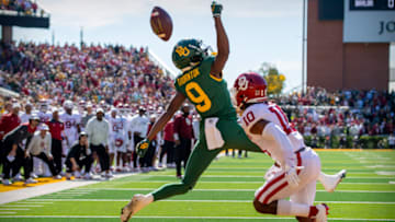 Nov 13, 2021; Waco, Texas, USA; Oklahoma Sooners safety Pat Fields (10) breaks up a pass intended for Baylor Bears wide receiver Tyquan Thornton (9) during the first half at McLane Stadium. Mandatory Credit: Jerome Miron-USA TODAY Sports