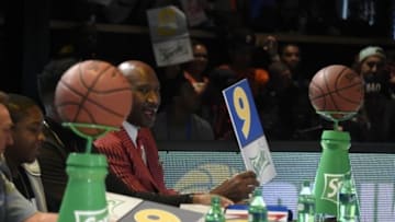 Feb 12, 2015; New York, NY, USA; NBA former player Darryl Dawkins shows his score for a dunk in the Sprit Slam Dunk Showdown at Skylight at Moynihan Station. Mandatory Credit: Bob Donnan-USA TODAY Sports
