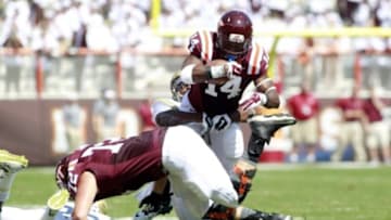 Sep 20, 2014; Blacksburg, VA, USA; Virginia Tech Hokies running back Trey Edmunds (14) rushes the ball during the first quarter against Georgia Tech Yellow Jackets at Lane Stadium. Mandatory Credit: Peter Casey-USA TODAY Sports