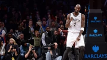 Jan 24, 2014; Brooklyn, NY, USA; Brooklyn Nets power forward Kevin Garnett (2) celebrates after defeating the Dallas Mavericks after the second half at Barclays Center. The Brooklyn Nets won the game 107-106. Mandatory Credit: Joe Camporeale-USA TODAY Sports