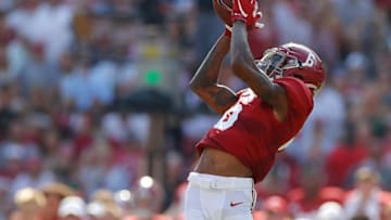 TUSCALOOSA, ALABAMA - SEPTEMBER 28: DeVonta Smith #6 of the Alabama Crimson Tide pulls in this reception against Jaylon Jones #31 of the Mississippi Rebels at Bryant-Denny Stadium on September 28, 2019 in Tuscaloosa, Alabama. (Photo by Kevin C. Cox/Getty Images)