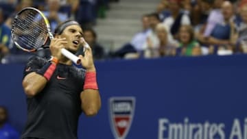 Sep 4, 2015; New York, NY, USA; Rafael Nadal of Spain reacts after missing a shot against Fabio Fognini of Italy (not pictured) on day five of the 2015 U.S. Open tennis tournament at USTA Billie Jean King National Tennis Center. Fognini won 3-6, 4-6, 6-4, 6-3, 6-4. Mandatory Credit: Geoff Burke-USA TODAY Sports