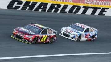 May 24, 2015; Concord, NC, USA; NASCAR Sprint Cup Series driver Jeff Gordon (24) leads driver Jimmie Johnson (48) during the Coca-Cola 600 at Charlotte Motor Speedway. Mandatory Credit: Randy Sartin-USA TODAY Sports