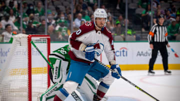 Oct 7, 2021; Dallas, Texas, USA; Dallas Stars goaltender Anton Khudobin (35) and Colorado Avalanche center Artem Anisimov (40) in action during the game between the Dallas Stars and the Colorado Avalanche at the American Airlines Center. Mandatory Credit: Jerome Miron-USA TODAY Sports