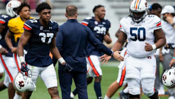 Auburn football head coach Bryan Harsin greets players after the game during Auburn football A-Day spring game at Jordan-Hare Stadium in Auburn, Ala., on Saturday, April 17, 2021.