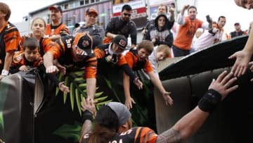 Nov 11, 2012; Cincinnati, OH, USA; Cincinnati Bengals middle linebacker Rey Maualuga (58) is congratulated by fans at the end of the game against the New York Giants at Paul Brown Stadium. The Bengals defeated the Giants 31-13. Mandatory Credit: Frank Victores-USA TODAY Sports