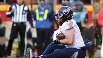 KANSAS CITY, MISSOURI - JANUARY 19: Dennis Kelly #71 of the Tennessee Titans catches a 1 yard touchdown pass in the second quarter against the Kansas City Chiefs in the AFC Championship Game at Arrowhead Stadium on January 19, 2020 in Kansas City, Missouri. (Photo by David Eulitt/Getty Images)