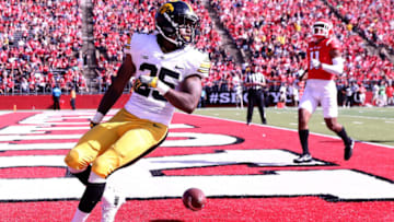 PISCATAWAY, NJ - SEPTEMBER 24: Akrum Wadley #25 of the Iowa Hawkeyes scores the game winning touchdown against the Rutgers Scarlet Knights at High Point Solutions Stadium on September 24, 2016 in Piscataway, New Jersey.The Iowa Hawkeyes defeated the Rutgers Scarlet Knights 14-7. (Photo by Elsa/Getty Images)