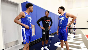 PLAYA VISTA, CA - JUNE 25: Draft Picks Shai Gilgeous-Alexander and Jerome Robinson pose for a photo with Lou Williams #23 of the LA Clippers during the Draft Press Conference at the Clippers Training Facility in Playa Vista, California on June 25, 2018 at Clippers Training Facility. NOTE TO USER: User expressly acknowledges and agrees that, by downloading and or using this photograph, User is consenting to the terms and conditions of the Getty Images License Agreement. Mandatory Copyright Notice: Copyright 2018 NBAE (Photo by Andrew D. Bernstein/NBAE via Getty Images)