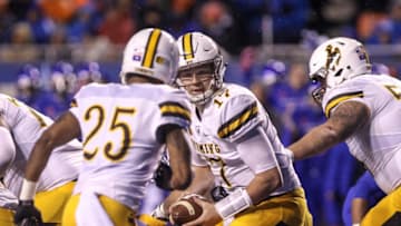 BOISE, ID - OCTOBER 21: Quarterback Josh Allen #17 of the Wyoming Cowboys turns to hand the ball off during second half action against the Boise State Broncos on October 21, 2017 at Albertsons Stadium in Boise, Idaho. Boise State won the game 24-14. (Photo by Loren Orr/Getty Images)