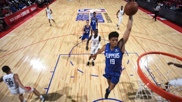 LAS VEGAS, NV - JULY 9: Desi Rodriguez #19 of the LA Clippers goes for a dunk against the Houston Rockets during the 2018 Las Vegas Summer League on July 9, 2018 at the Thomas & Mack Center in Las Vegas, Nevada. NOTE TO USER: User expressly acknowledges and agrees that, by downloading and or using this Photograph, user is consenting to the terms and conditions of the Getty Images License Agreement. Mandatory Copyright Notice: Copyright 2018 NBAE (Photo by Garrett Ellwood/NBAE via Getty Images)