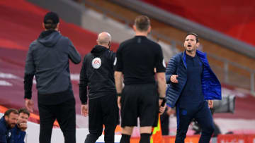 LIVERPOOL, ENGLAND - JULY 22: Frank Lampard, Manager of Chelsea and Jurgen Klopp, Manager of Liverpool speak during the Premier League match between Liverpool FC and Chelsea FC at Anfield on July 22, 2020 in Liverpool, England. Football Stadiums around Europe remain empty due to the Coronavirus Pandemic as Government social distancing laws prohibit fans inside venues resulting in all fixtures being played behind closed doors. (Photo by Laurence Griffiths/Getty Images)