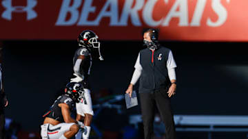 Luke Fickell of the Cincinnati Bearcats is seen during game. Getty Images.