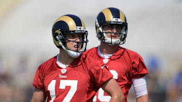 Jul 31, 2016; Irvine, CA, USA; Los Angeles Rams quarterbacks Case Keenum (17) and Jared Goff (16) look on at training camp at UC Irvine. Mandatory Credit: Kirby Lee-USA TODAY Sports