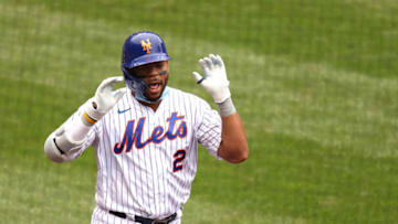 NEW YORK, NEW YORK - AUGUST 13: Dominic Smith #2 of the New York Mets celebrates his second inning home run against Austin Voth #50 of the Washington Nationals during their game at Citi Field on August 13, 2020 in New York City. (Photo by Al Bello/Getty Images)