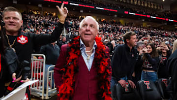 LUBBOCK, TEXAS - FEBRUARY 01: Former professional wrestler Ric Flair walks onto the court before the college basketball game between the Texas Tech Red Raiders and the Texas Longhorns at United Supermarkets Arena on February 01, 2022 in Lubbock, Texas. (Photo by John E. Moore III/Getty Images)