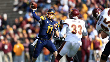 TOLEDO, OH - OCTOBER 22: Quarterback Logan Woodside #11 of the Toledo Rockets throws a pass against Central Michigan Chippewas at Glass Bowl on October 22, 2016 in Toledo, Ohio. (Photo by Andrew Weber/Getty Images)
