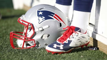 Nov 8, 2015; Foxborough, MA, USA; The feet and helmet of New England Patriots kicker Stephen Gostkowski (not pictured) as he sits on the bench during the second quarter against the Washington Redskins at Gillette Stadium. Mandatory Credit: Greg M. Cooper-USA TODAY Sports