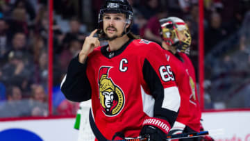OTTAWA, ON - FEBRUARY 15: Ottawa Senators Defenceman Erik Karlsson (65) fixes his chin strap during first period National Hockey League action between the Buffalo Sabres and Ottawa Senators on February 15, 2018, at Canadian Tire Centre in Ottawa, ON, Canada. (Photo by Richard A. Whittaker/Icon Sportswire via Getty Images)