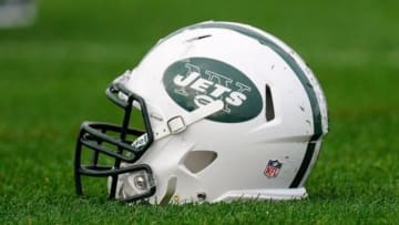 July 29, 2012; Cortland, NY, USA; A general view of a New York Jets helmet on the ground during training camp at SUNY Cortland. Mandatory Credit: Rich Barnes-USA TODAY Sports