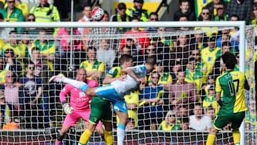 NORWICH, ENGLAND - APRIL 02: Aleksandar Mitrovic of Newcastle United heads the ball to score his team's first goal during the Barclays Premier League match between Norwich City and Newcastle United at Carrow Road on April 2, 2016 in Norwich, England. (Photo by Dan Mullan/Getty Images)