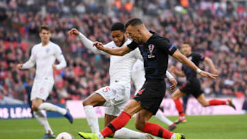 LONDON, ENGLAND - NOVEMBER 18: Ivan Perisic of Croatia is challenged by Joe Gomez of England during the UEFA Nations League A group four match between England and Croatia at Wembley Stadium on November 18, 2018 in London, United Kingdom. (Photo by Laurence Griffiths/Getty Images)