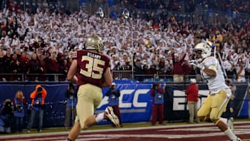 CHARLOTTE, NC - DECEMBER 06: Nick O'Leary #35 of the Florida State Seminoles runs the ball after a reception for a touchdown in the 1st quarter against the Georgia Tech Yellow Jackets during the ACC Championship game n December 6, 2014 in Charlotte, North Carolina. (Photo by Mike Ehrmann/Getty Images)