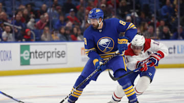 Oct 27, 2022; Buffalo, New York, USA; Montreal Canadiens right wing Brendan Gallagher (11) defends as Buffalo Sabres right wing Alex Tuch (89) controls the puck during the second period at KeyBank Center. Mandatory Credit: Timothy T. Ludwig-USA TODAY Sports