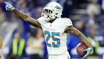 INDIANAPOLIS, IN - NOVEMBER 25: Xavien Howard #25 of the Miami Dolphins celebrates after intercepting a pass in the final minute of the first half against the Indianapolis Colts at Lucas Oil Stadium on November 25, 2018 in Indianapolis, Indiana. (Photo by Andy Lyons/Getty Images)