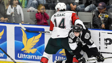 BOISBRIAND, QC - OCTOBER 20: Jared McIsaac #14 of the Halifax Mooseheads pins Luke Henman #16 of the Blainville-Boisbriand Armada against the boards during the QMJHL game at Centre d'Excellence Sports Rousseau on October 20, 2017 in Boisbriand, Quebec, Canada. (Photo by Minas Panagiotakis/Getty Images)