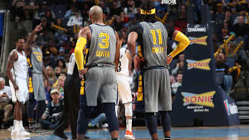 MEMPHIS, TN - JANUARY 4: Jevon Carter #3 and Mike Conley #11 of the Memphis Grizzlies look on during the game against the Brooklyn Nets on January 4, 2019 at FedExForum in Memphis, Tennessee. NOTE TO USER: User expressly acknowledges and agrees that, by downloading and/or using this photograph, user is consenting to the terms and conditions of the Getty Images License Agreement. Mandatory Copyright Notice: Copyright 2019 NBAE (Photo by Joe Murphy/NBAE via Getty Images)