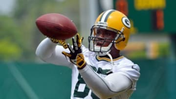 Jun 11, 2013; Green Bay, WI, USA; Green Bay Packers tight end Jermichael Finley works out during organized team activities at Clarke Hinkle Field in Green Bay. Mandatory Credit: Benny Sieu-USA TODAY Sports
