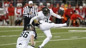 Nov 21, 2015; Columbus, OH, USA; Michigan State Spartans place kicker Michael Geiger (4) makes the game-winning field goal on the final play of the game against the Ohio State Buckeyes at Ohio Stadium. The Spartans won 17-14. Mandatory Credit: Geoff Burke-USA TODAY Sports