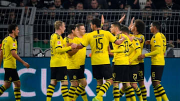 Dortmund's players celebrate the offside goal during the German first division Bundesliga football match BVB Borussia Dortmund v Borussia Moenchengladbach in Dortmund, western Germany on October 19, 2019. (Photo by Ina FASSBENDER / AFP) / RESTRICTIONS: DFL REGULATIONS PROHIBIT ANY USE OF PHOTOGRAPHS AS IMAGE SEQUENCES AND/OR QUASI-VIDEO (Photo by INA FASSBENDER/AFP via Getty Images)