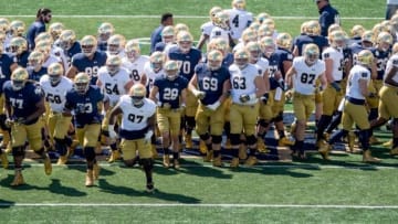 Apr 16, 2016; South Bend, IN, USA; The Notre Dame Fighting Irish break their huddle after warmups prior to the Blue-Gold Game at Notre Dame Stadium. Mandatory Credit: Matt Cashore-USA TODAY Sports