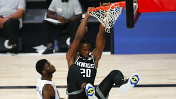 Former Duke basketball standout Harry Giles dunks for the Sacramento Kings. (Photo by Kim Klement-Pool/Getty Images)