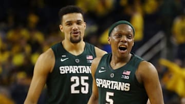 ANN ARBOR, MICHIGAN - FEBRUARY 24: Cassius Winston #5 and Kenny Goins #25 of the Michigan State Spartans react after a 77-70 win over the Michigan Wolverines at Crisler Arena on February 24, 2019 in Ann Arbor, Michigan. (Photo by Gregory Shamus/Getty Images)