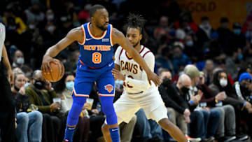 CLEVELAND, OHIO - JANUARY 24: Kemba Walker #8 of the New York Knicks looks for a pass while under pressure from Darius Garland #10 of the Cleveland Cavaliers during the second half at Rocket Mortgage Fieldhouse on January 24, 2022 in Cleveland, Ohio. The Cavaliers defeated the Knicks 95-93. NOTE TO USER: User expressly acknowledges and agrees that, by downloading and/or using this photograph, user is consenting to the terms and conditions of the Getty Images License Agreement. (Photo by Jason Miller/Getty Images)
