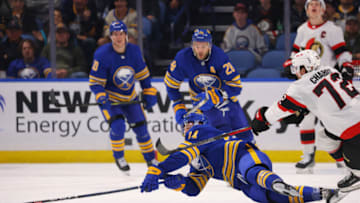 Oct 13, 2022; Buffalo, New York, USA; Buffalo Sabres center Rasmus Asplund (74) dives to clear the puck during the second period against the Ottawa Senators at KeyBank Center. Mandatory Credit: Timothy T. Ludwig-USA TODAY Sports